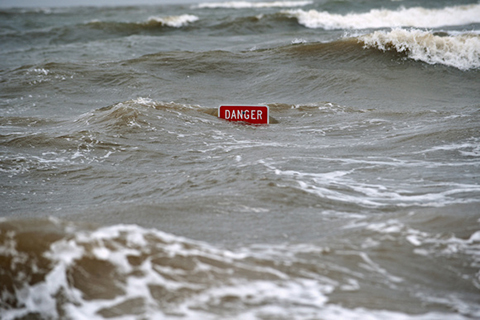 High flood waters show danger sign